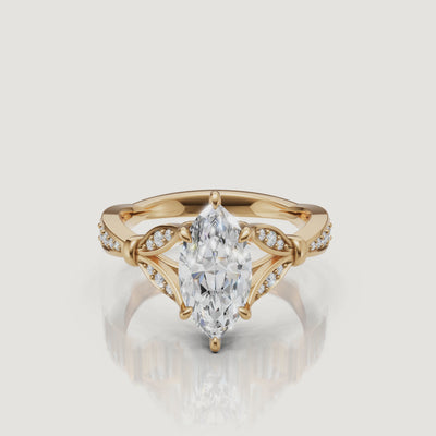 Rotating video of Raul Diamonds marquise cut lab grown diamond engagement ring in 14K yellow gold with pavé accents