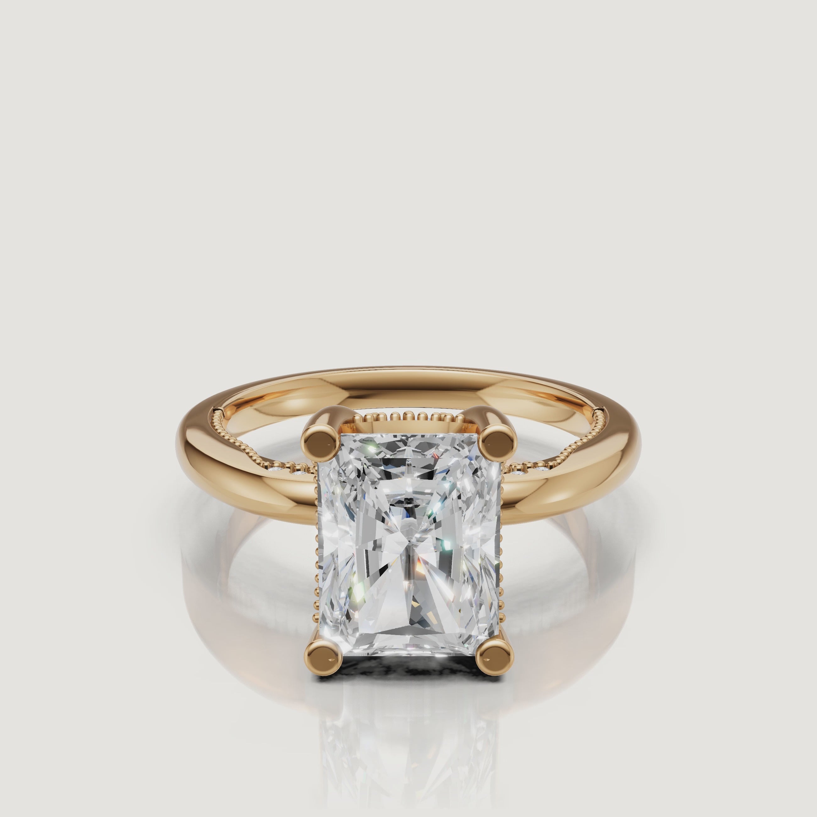 Cinematic 4K video of a Raul Diamonds radiant cut ring in yellow gold, demonstrating the 'crushed ice' sparkle and warm 18k gold glow
