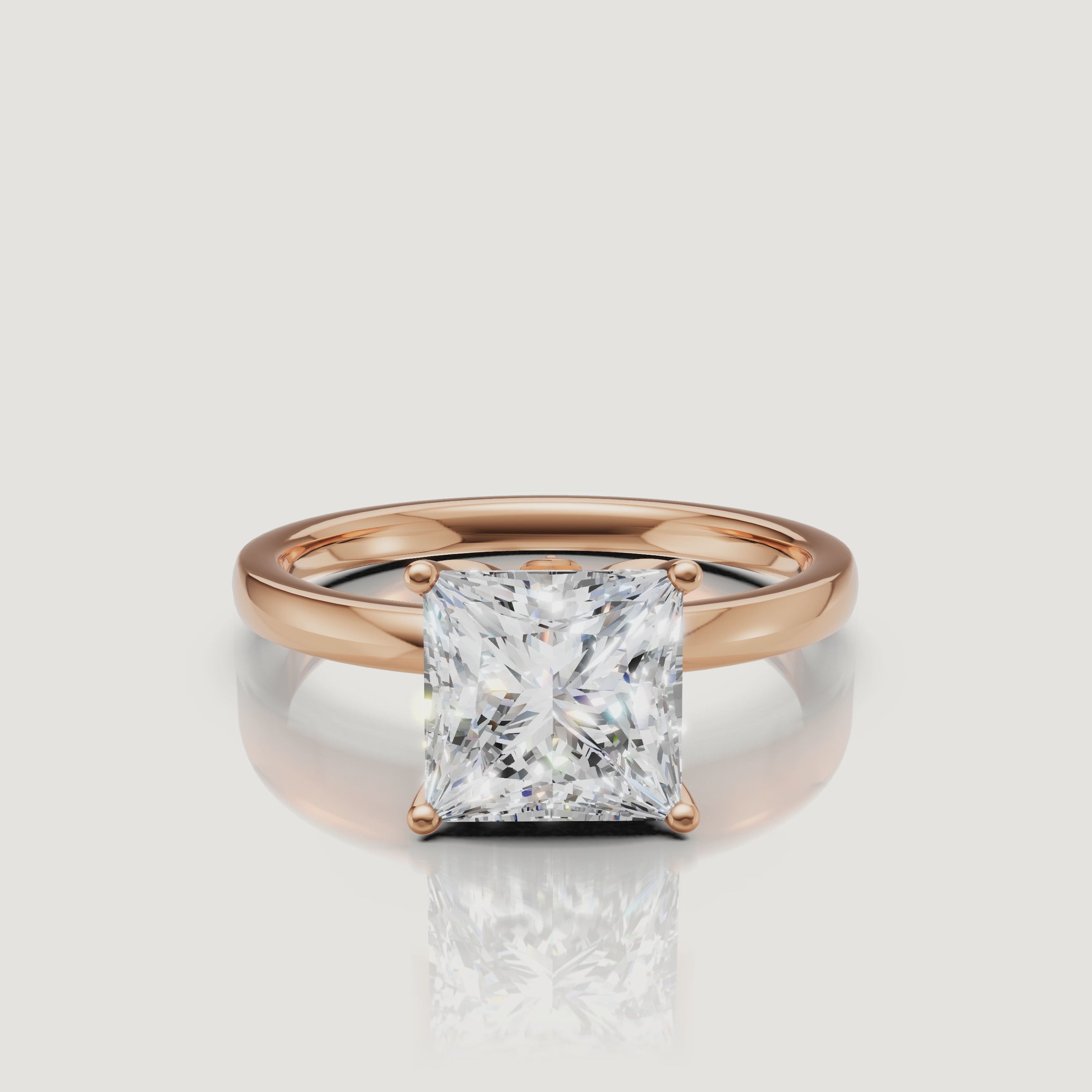 360-degree video showcase of a rose gold princess cut diamond ring by Raul Diamonds, highlighting the trendy blush metal tones and the diamond's brilliant fire.
