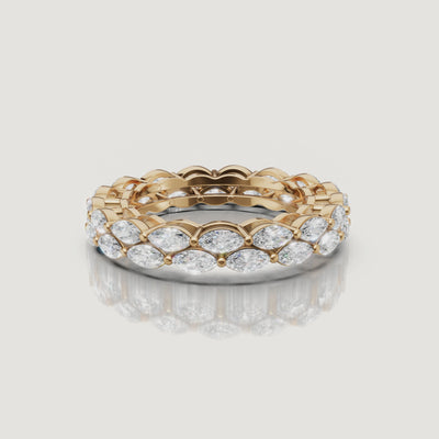 rotating view of marquise cut lab grown diamond eternity band in polished 14k gold