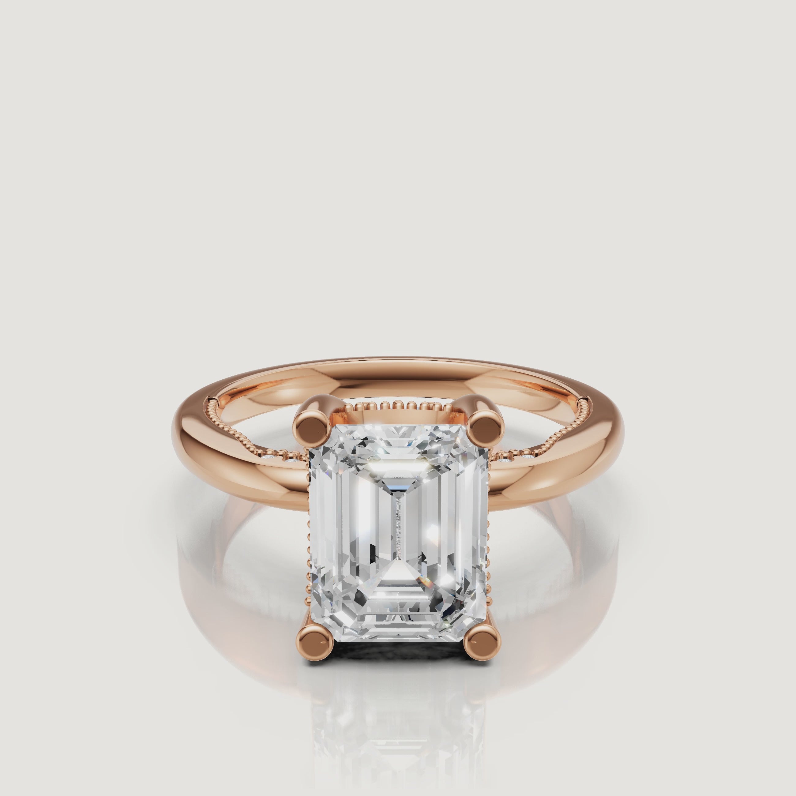 Macro video of a white gold emerald cut solitaire ring from Raul Diamonds, displaying the sharp geometric lines and brilliant white light performance.