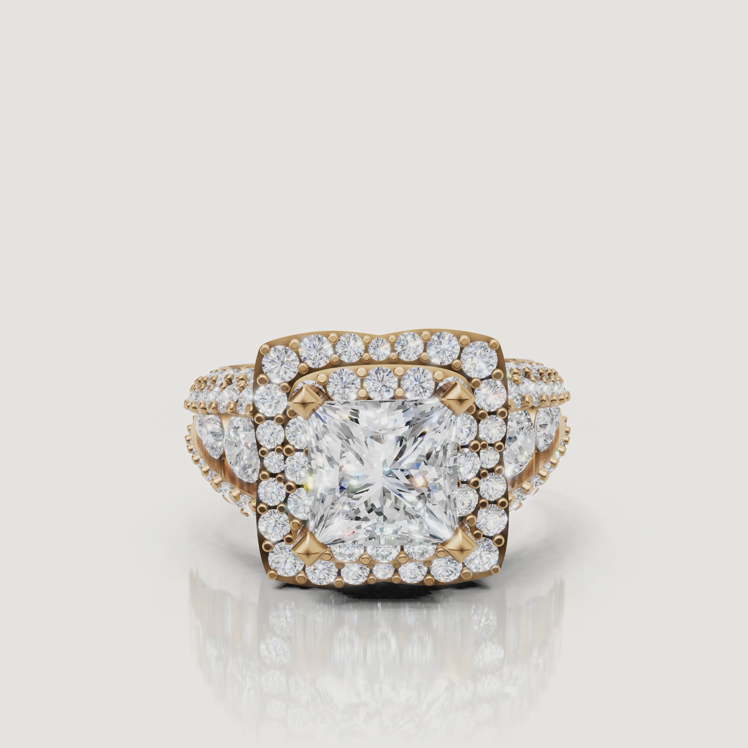360 video of Raul Diamonds princess cut halo engagement ring in yellow gold with pavé diamonds.