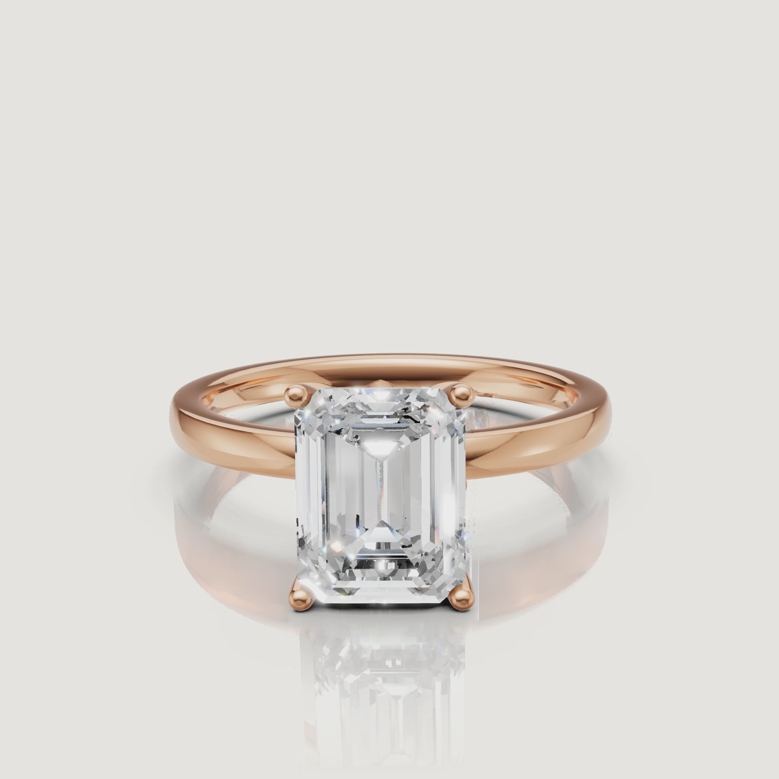 Cinematic video of a rose gold emerald cut diamond ring by Raul Diamonds, highlighting the sophisticated contrast between the warm metal and the rectangular diamond brilliance