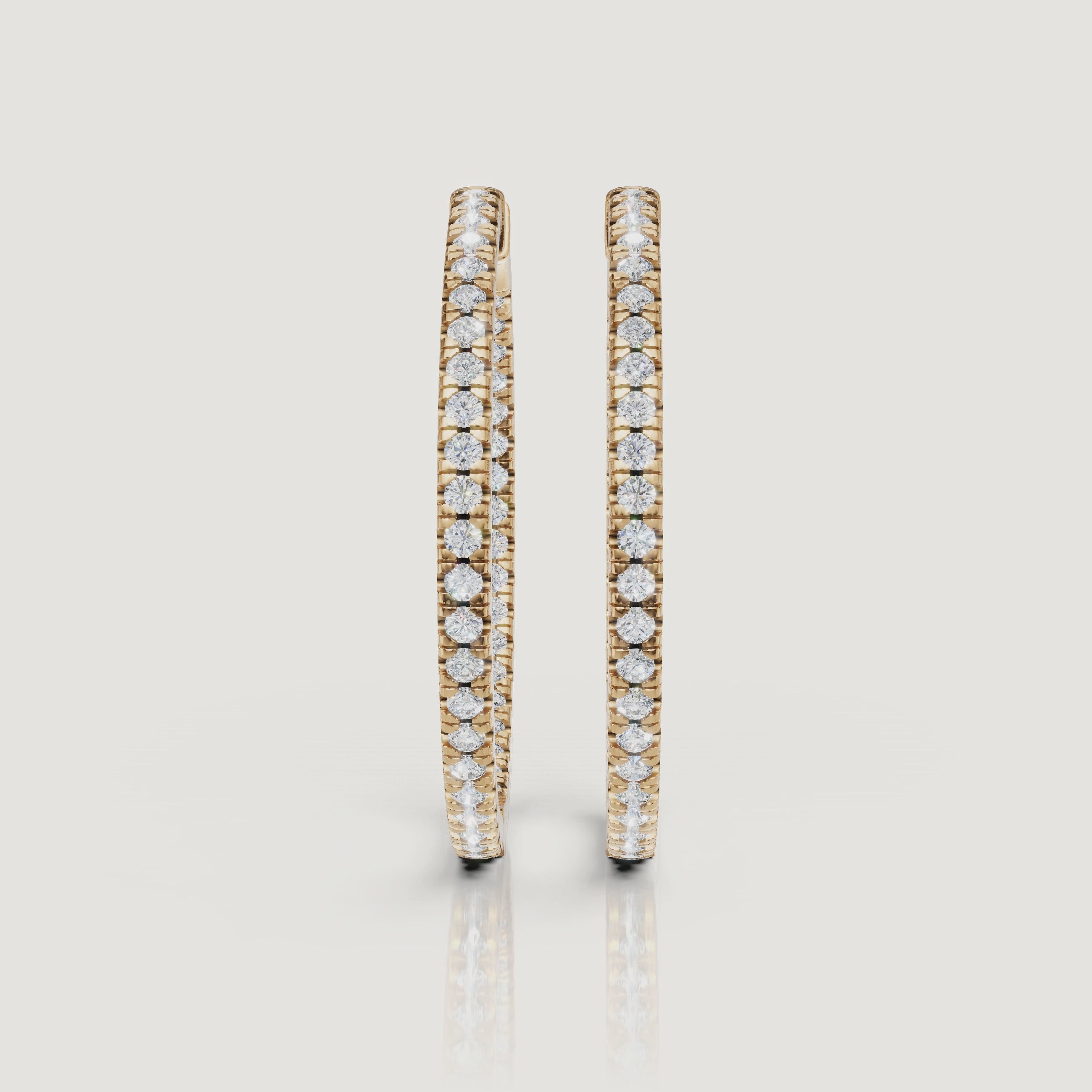 Yellow gold pave diamond hoop earrings video showcasing brilliant sparkle by Raul Diamonds