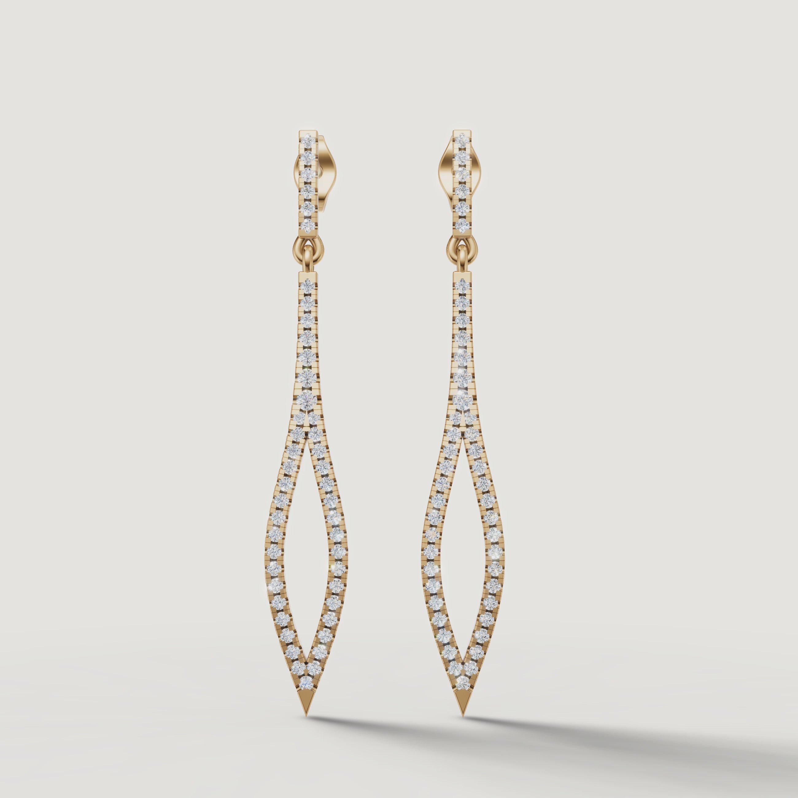 Yellow gold diamond marquise earrings sparkling video Raul Diamonds