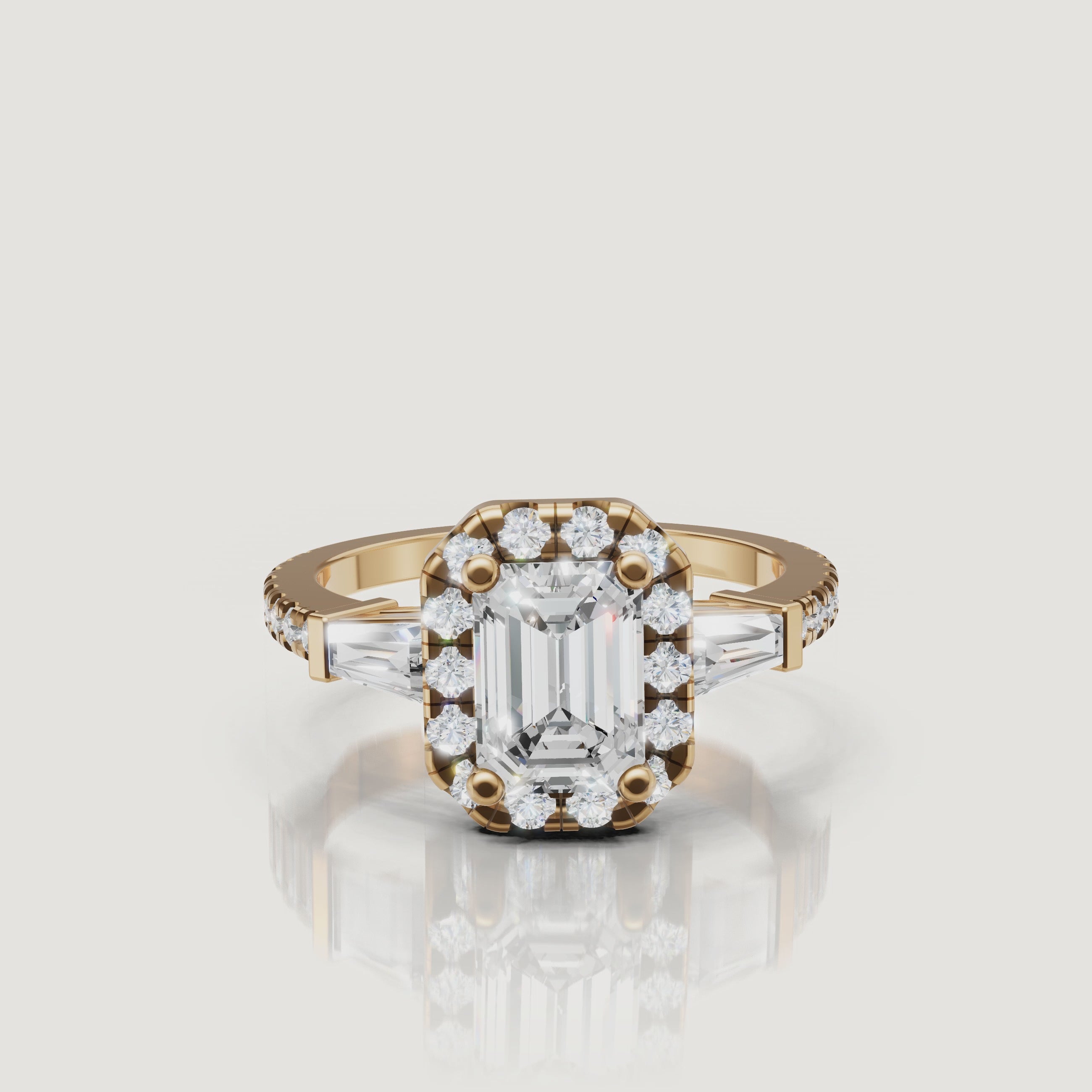 Yellow Gold Video Alt Text: Raul Diamonds emerald cut halo diamond engagement ring video in yellow gold