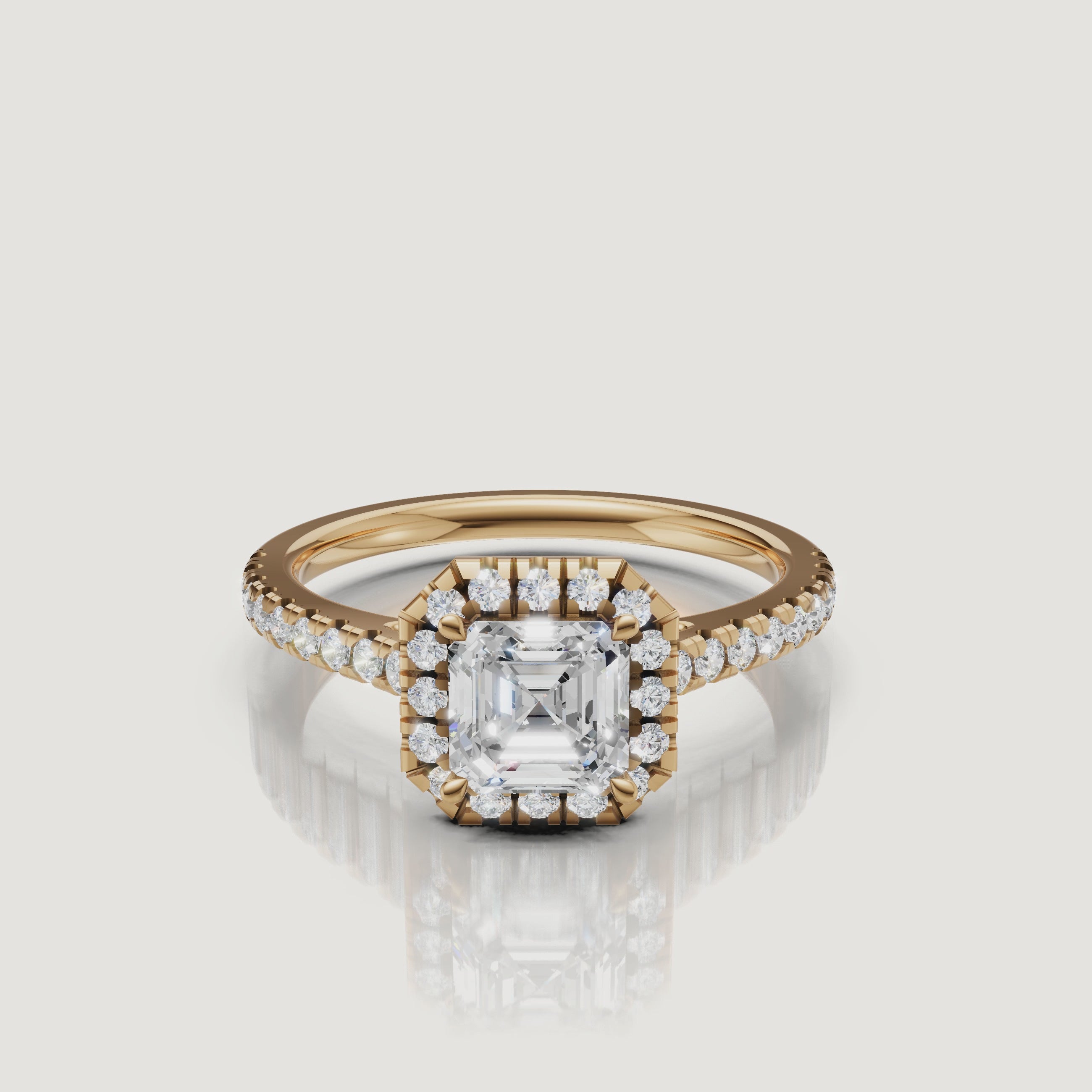 video of asscher cut lab grown diamond halo engagement ring with pavé band in 14k yellow gold