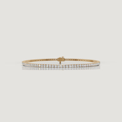 Cinematic video of a 2 carat lab grown diamond tennis bracelet in yellow gold by Raul Diamonds featuring macro diamond sparkle, elegant wrist movement, warm luxury lighting, and premium fine jewelry styling for modern women.