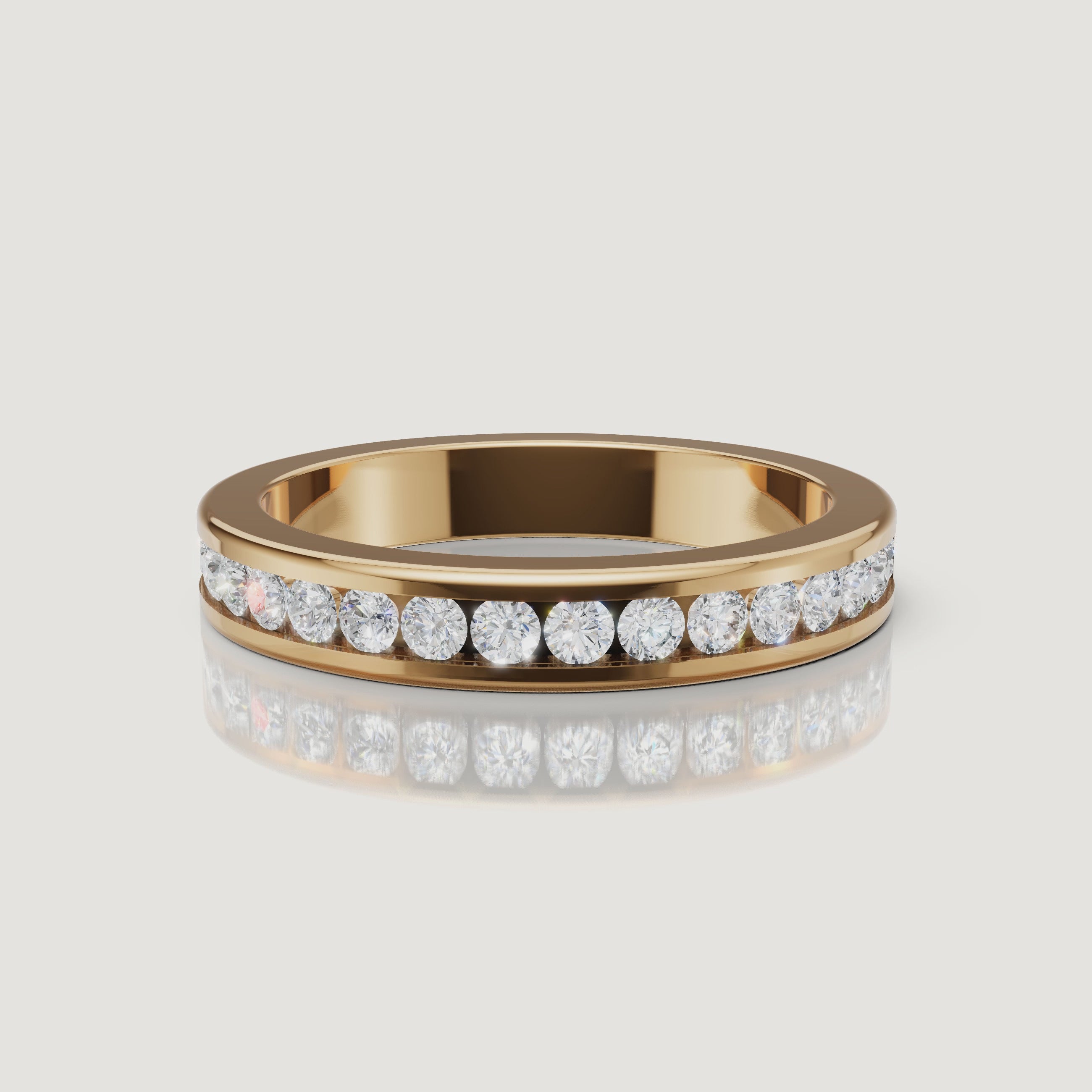360 rotating video of Raul Diamonds yellow gold channel set diamond wedding band with round brilliant diamonds