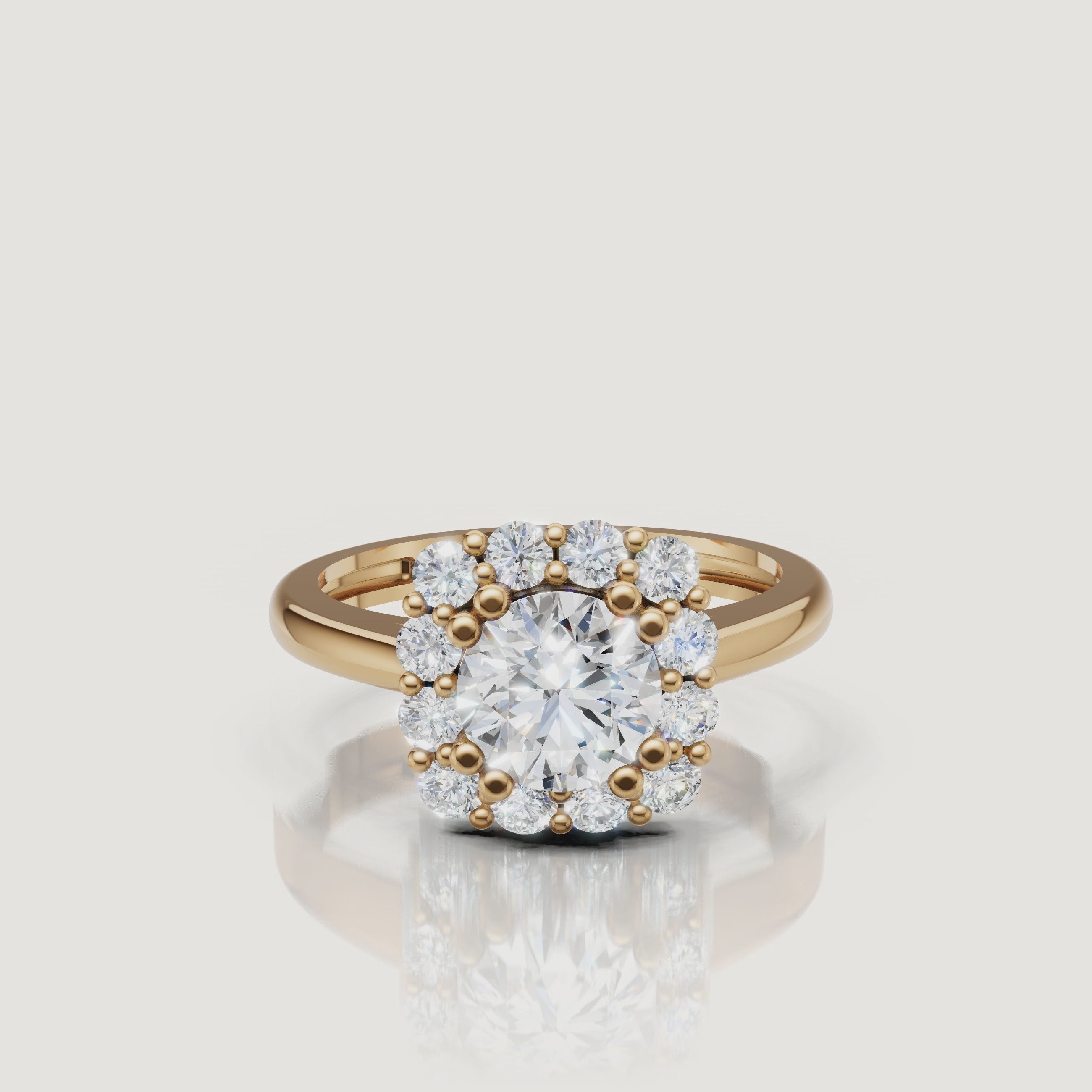 360 video of Raul Diamonds round halo engagement ring in yellow gold with floral diamond halo.