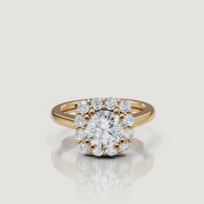 360 video of Raul Diamonds round halo engagement ring in yellow gold with floral diamond halo.
