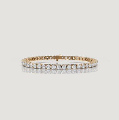 Cinematic video of a 6 carat lab grown diamond tennis bracelet in 14K yellow gold by Raul Diamonds featuring brilliant round diamonds, macro sparkle shots, graceful wrist movement, warm luxury lighting, and premium fine jewelry styling.