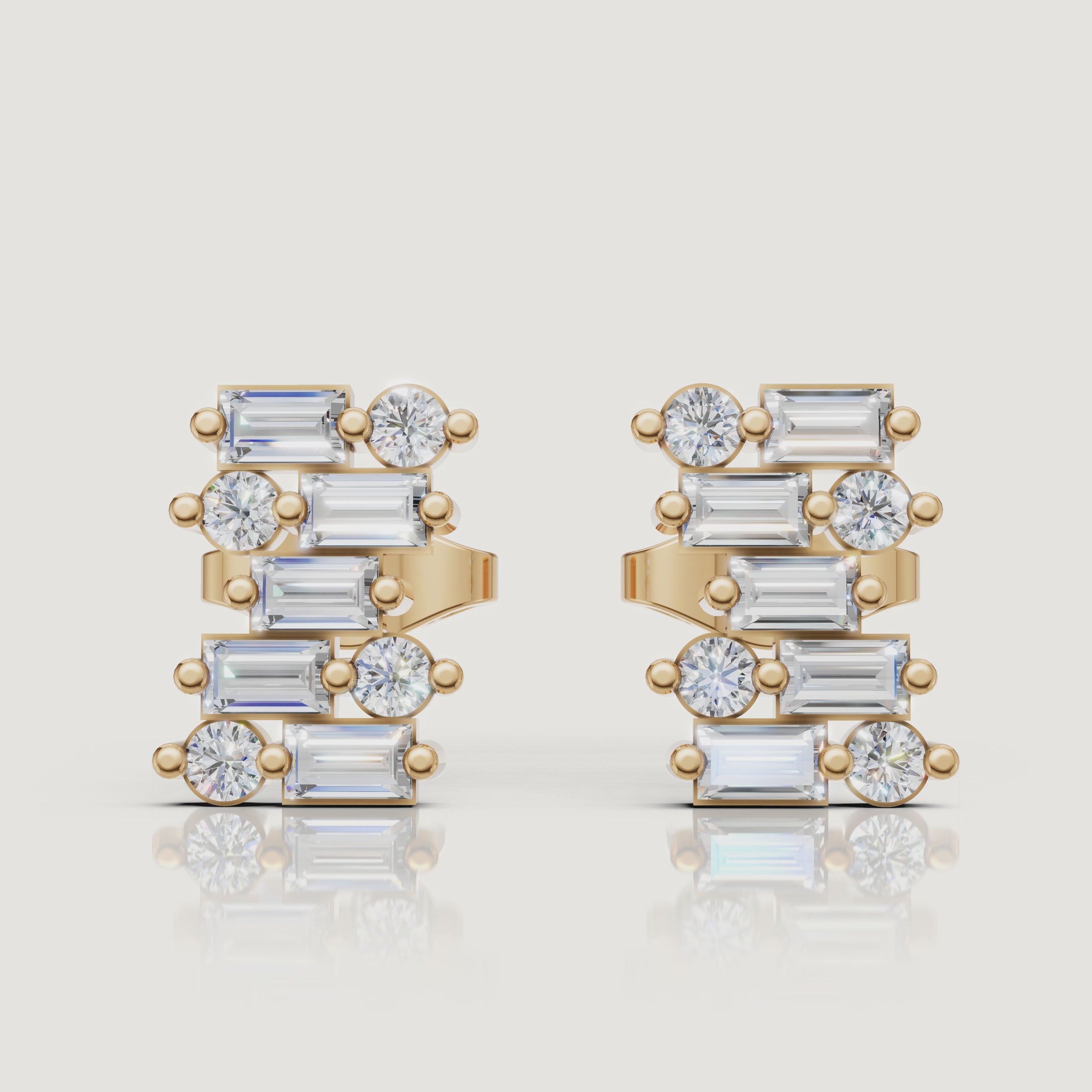 Yellow gold layered diamond stud earrings video by Raul Diamonds