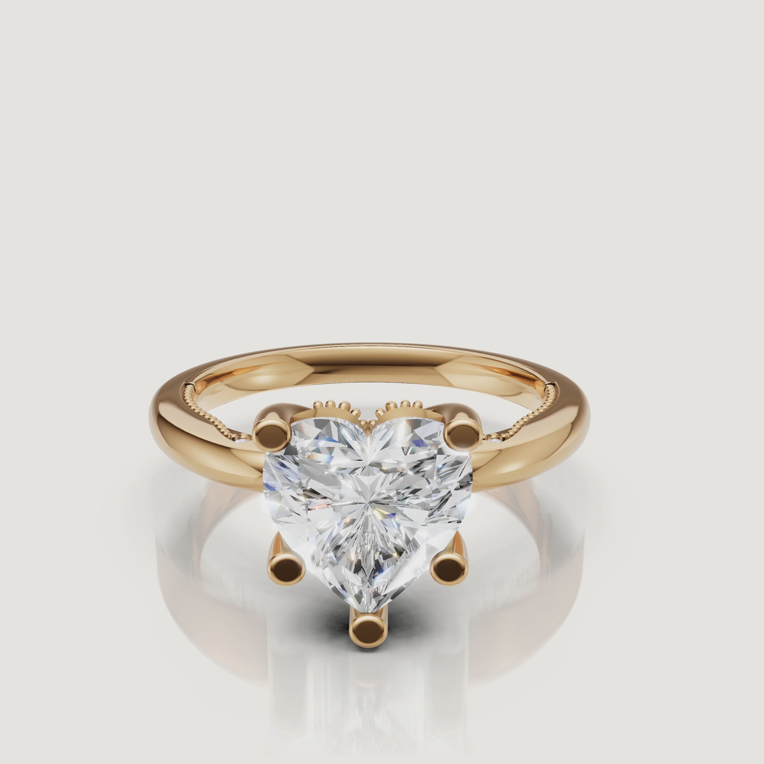 Cinematic video of a Raul Diamonds heart-cut ring in yellow gold, featuring a slow rotation to show the perfect symmetry and warm gold glow.