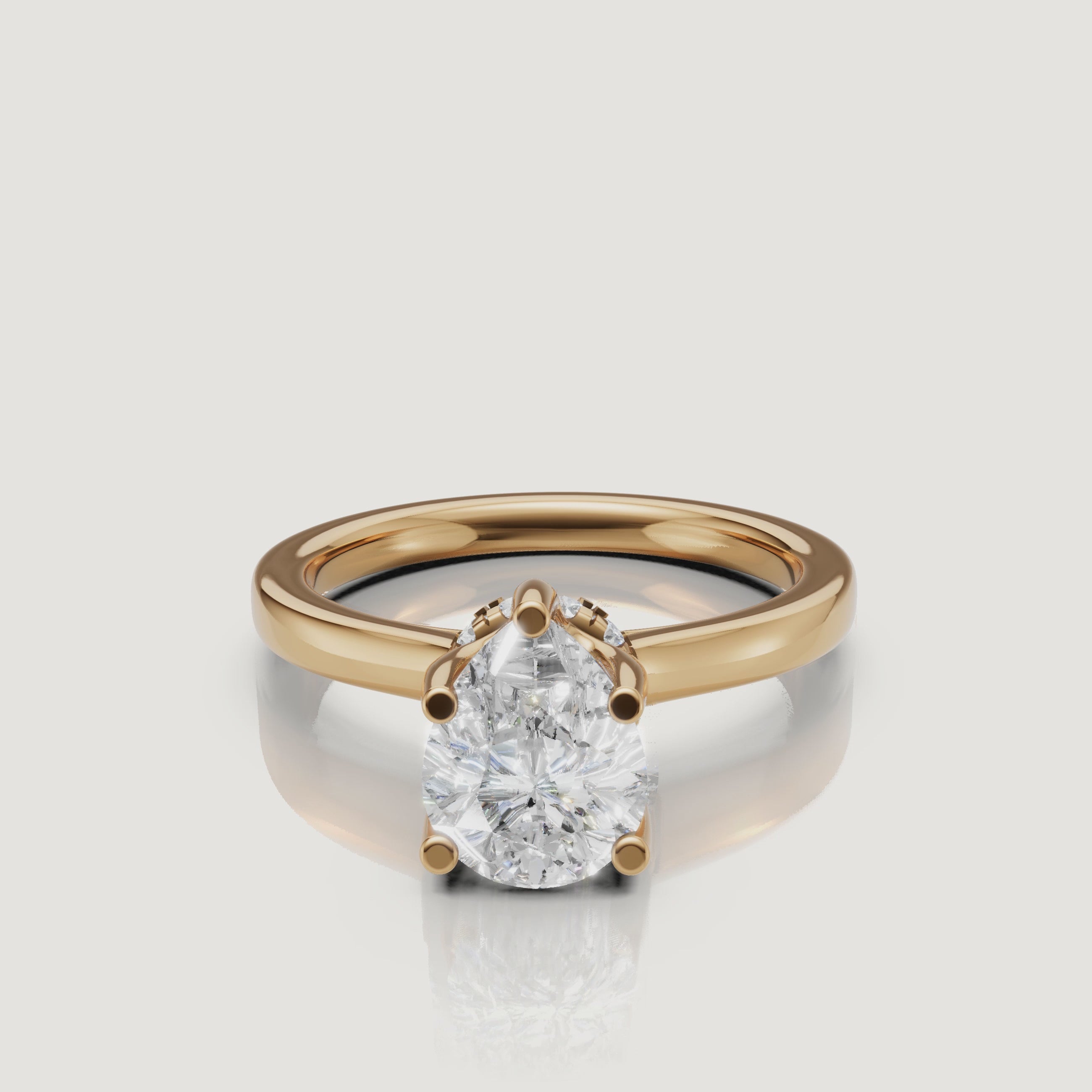 video of pear cut lab grown diamond solitaire engagement ring in 14k yellow gold