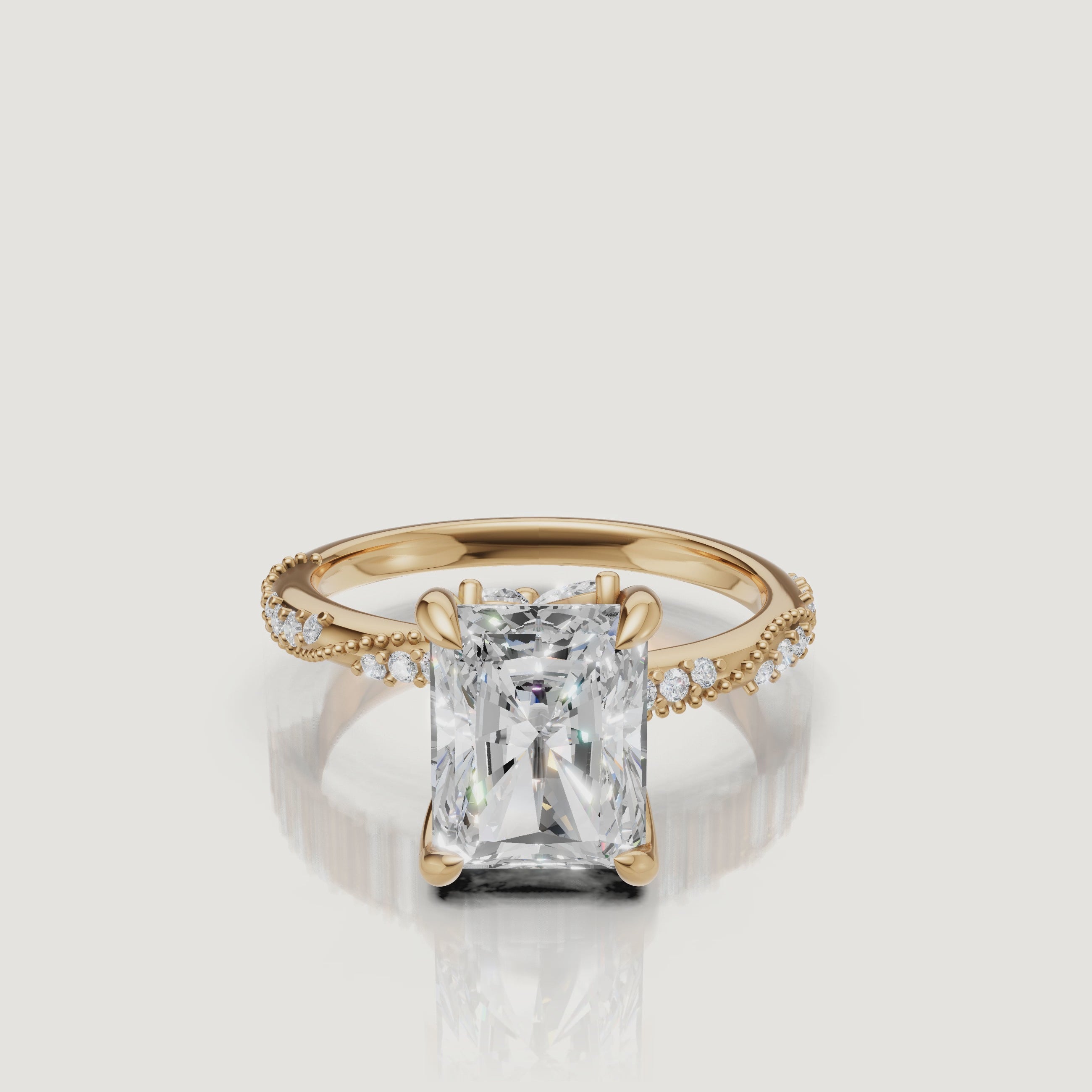 14K yellow gold radiant cut lab grown diamond engagement ring with twisted pavé band and crushed ice sparkle by Raul Diamonds