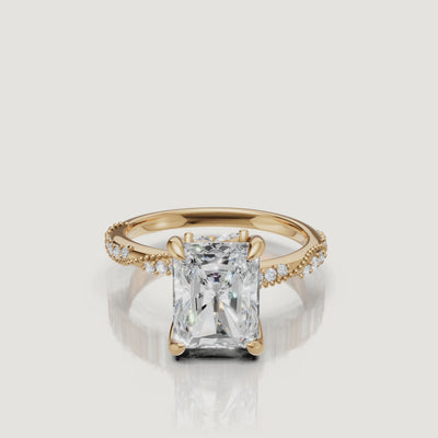 14K yellow gold radiant cut lab grown diamond engagement ring with twisted pavé band and crushed ice sparkle by Raul Diamonds