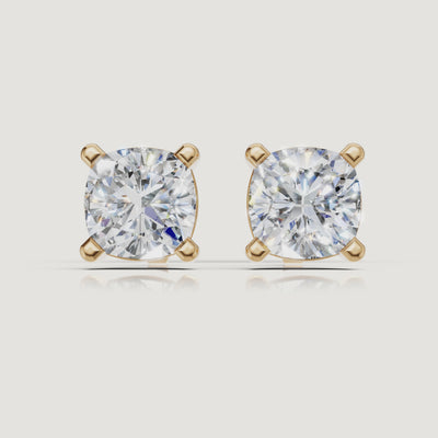 Yellow gold cushion cut diamond stud earrings cinematic jewelry video by Raul Diamonds