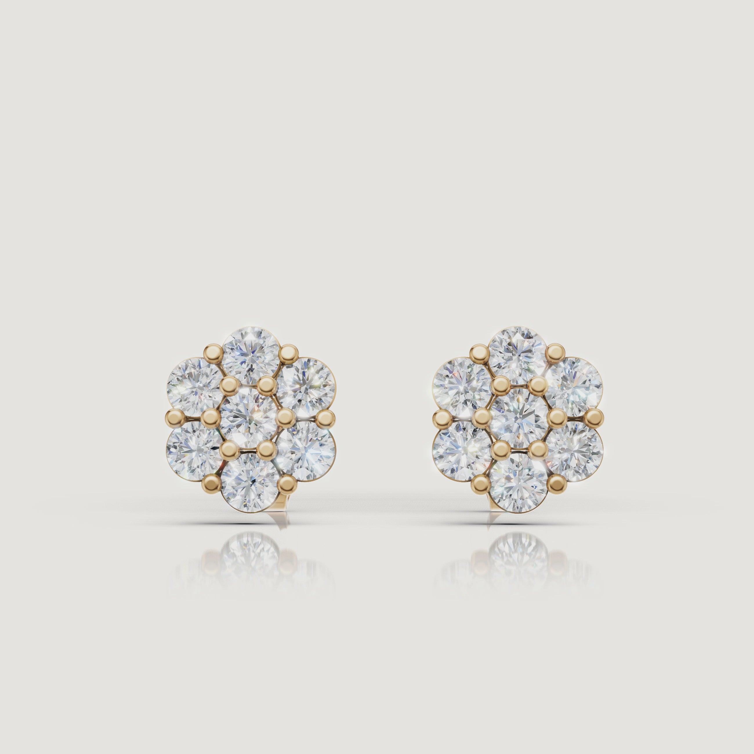 Yellow gold floral diamond cluster stud earrings video showcasing brilliant sparkle by Raul Diamonds