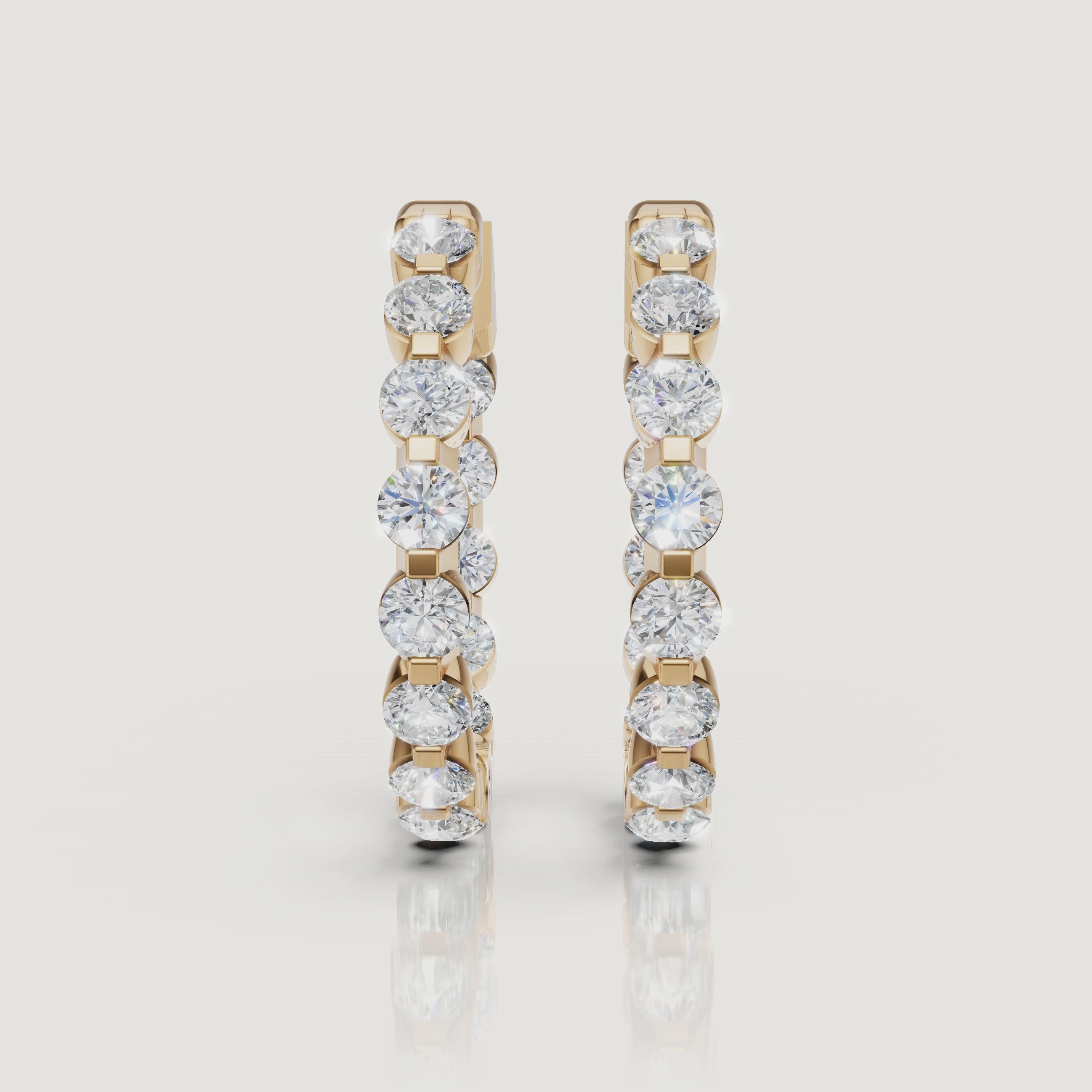 Yellow gold round diamond hoop earrings video with brilliant lab grown diamond sparkle and elegant luxury styling by Raul Diamonds