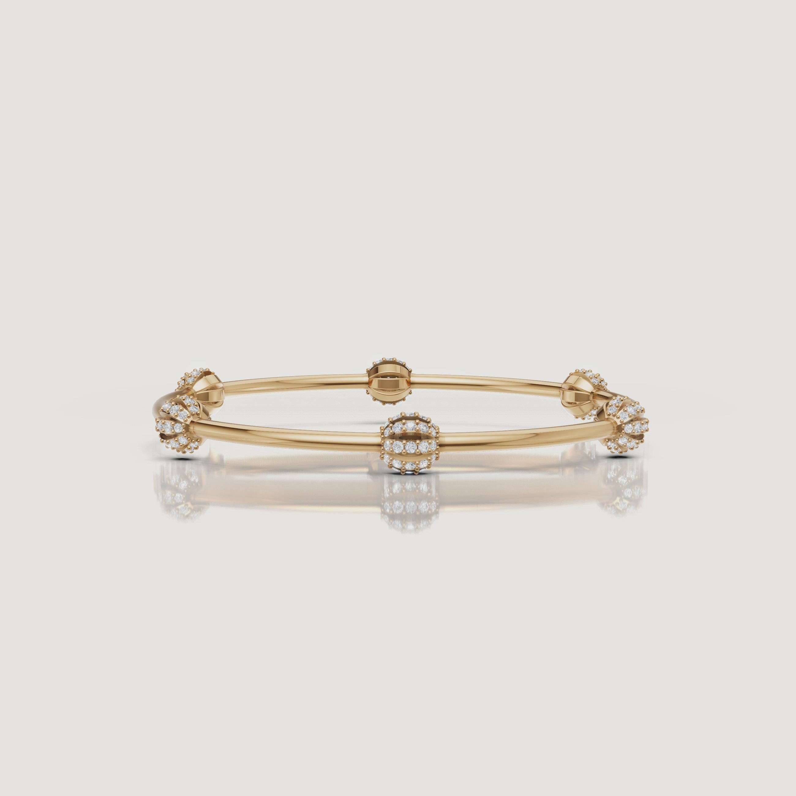 Yellow gold floral diamond bangle bracelet video by Raul Diamonds with sparkling cluster design