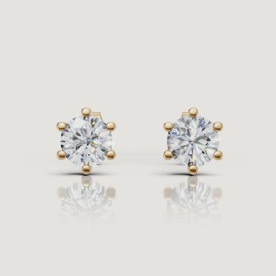 Yellow gold round diamond stud earrings video showcasing brilliant solitaire sparkle by Raul Diamonds