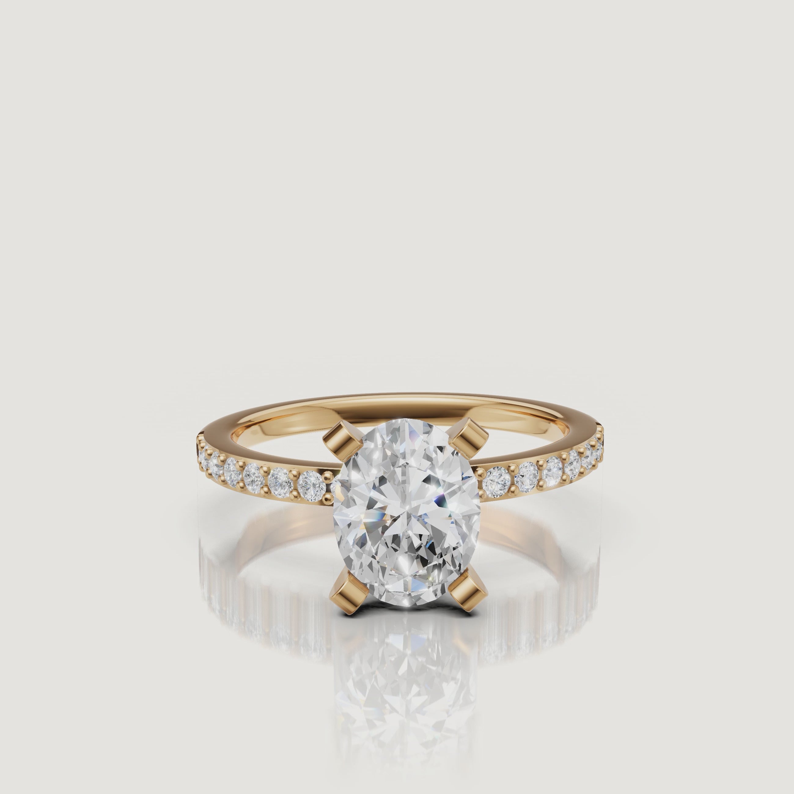 Oval cut lab grown diamond pavé engagement ring in 14K yellow gold by Raul Diamonds video view