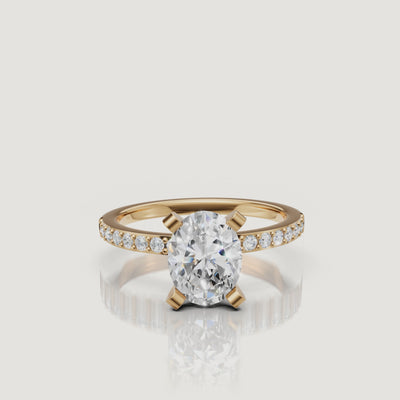 Oval cut lab grown diamond pavé engagement ring in 14K yellow gold by Raul Diamonds video view