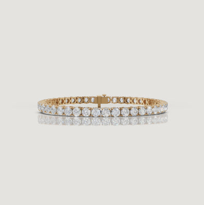 Cinematic video of an 8 carat lab grown diamond tennis bracelet in 14K yellow gold by Raul Diamonds featuring round brilliant diamonds, macro sparkle close-ups, graceful wrist movement, warm luxury lighting, and premium fine jewelry craftsmanship.