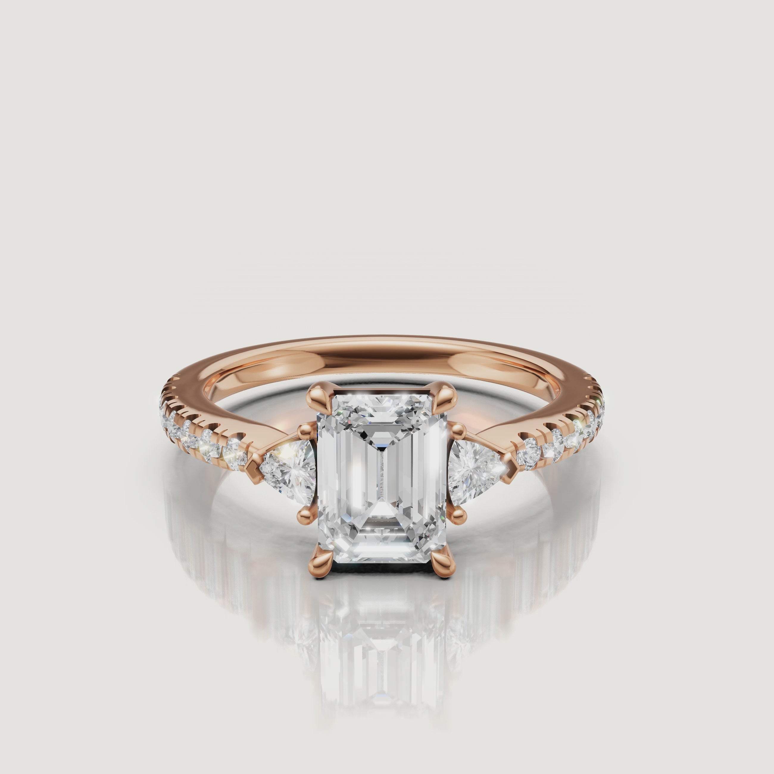 Cinematic close-up video of a Rual Diamonds three-stone emerald cut diamond ring, demonstrating the light performance and 'hall of mirrors' effect of the center stone