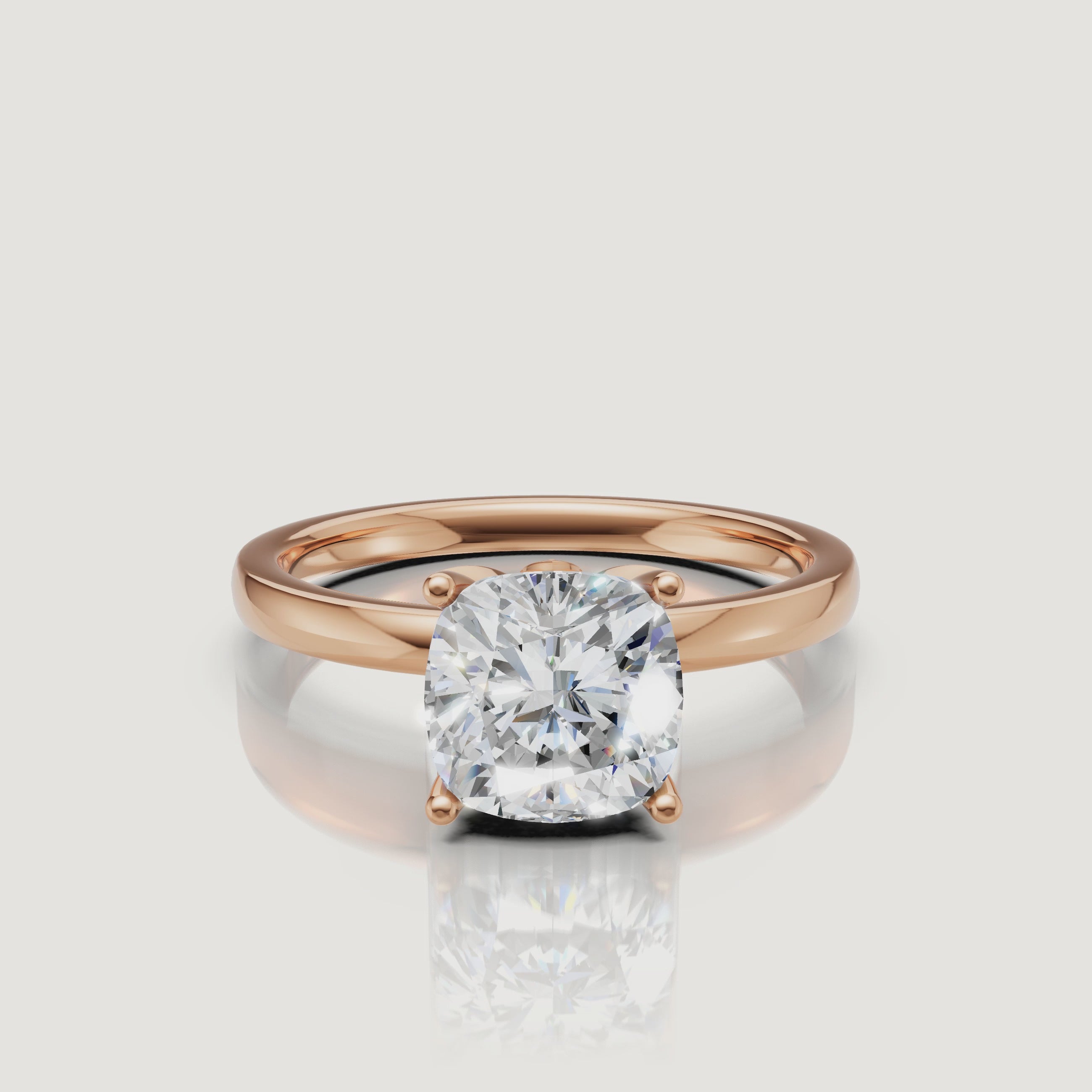 Video display of a romantic rose gold cushion cut diamond ring by Raul Diamonds, highlighting the elegant contrast between the blush metal and the white diamond