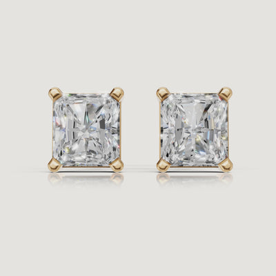 Yellow gold radiant cut diamond stud earrings cinematic jewelry video by Raul Diamonds