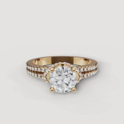 Rotating video of Raul Diamonds yellow gold round solitaire engagement ring with pave split shank.