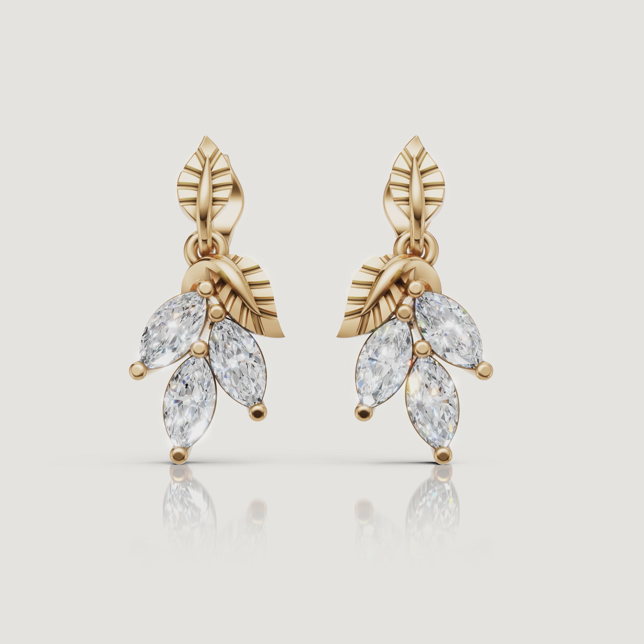 Yellow gold marquise diamond leaf earrings luxury jewelry video by Raul Diamonds