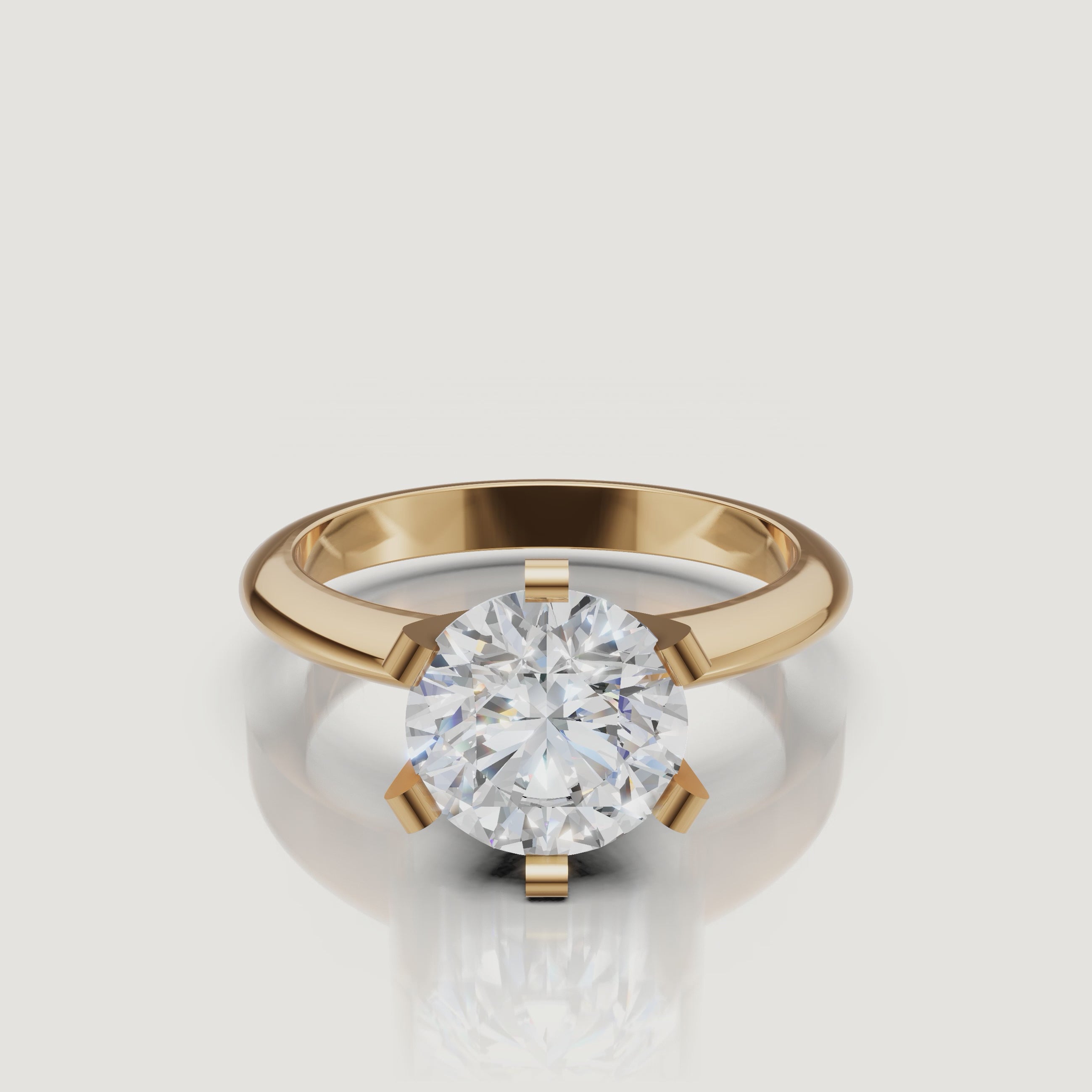 360 video of Raul Diamonds yellow gold round solitaire diamond ring with timeless four prong setting.