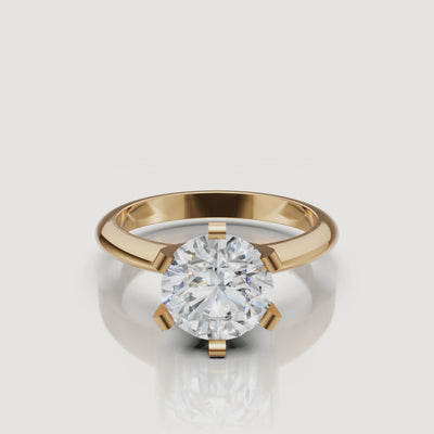 360 video of Raul Diamonds yellow gold round solitaire diamond ring with timeless four prong setting.