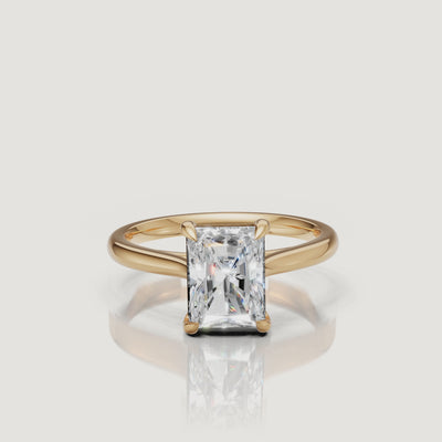 Rotating video of Raul Diamonds radiant cut yellow gold solitaire engagement ring with polished band