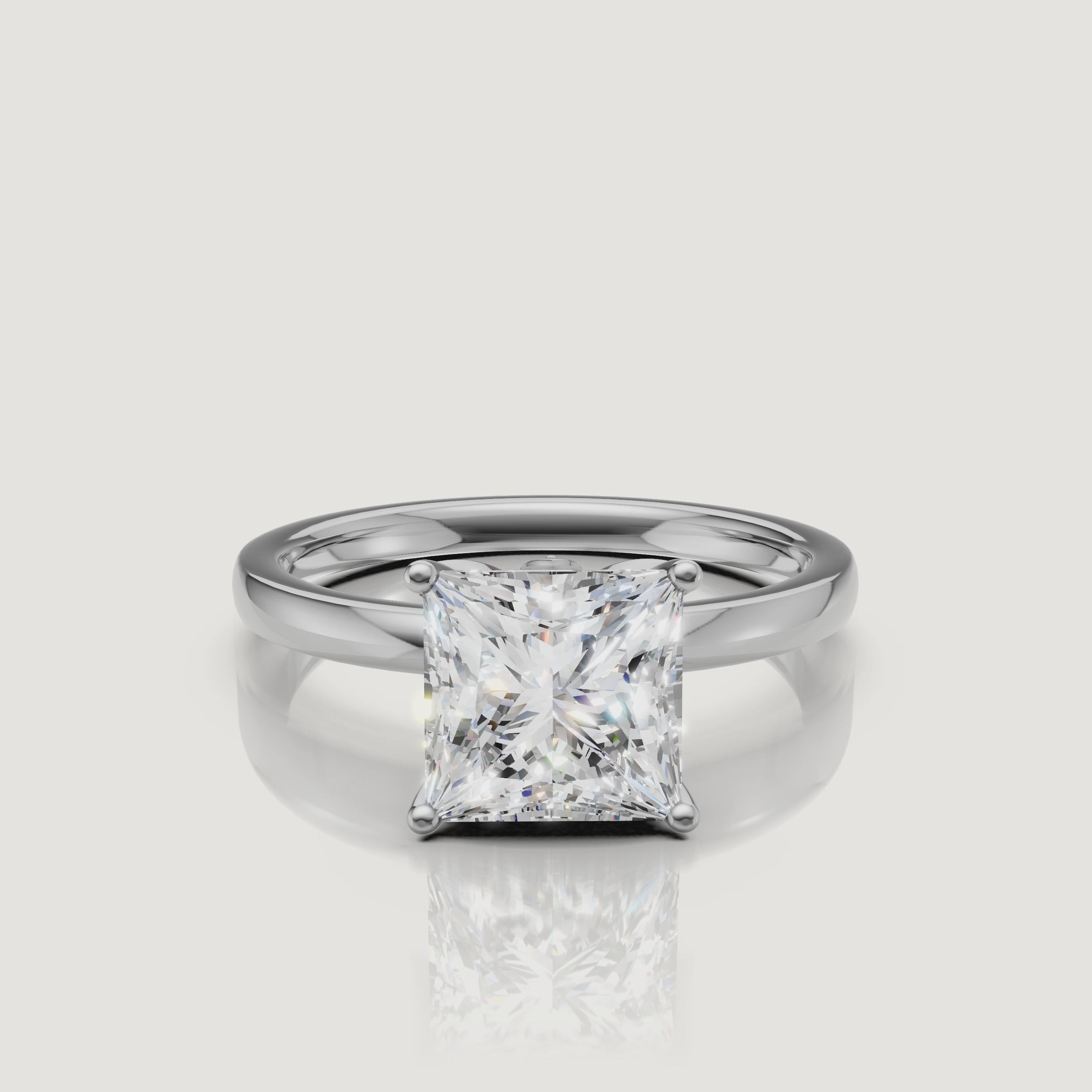Cinematic video of a white gold princess cut solitaire engagement ring from Raul Diamonds, demonstrating the crisp lines and brilliant-cut facets of the square center stone