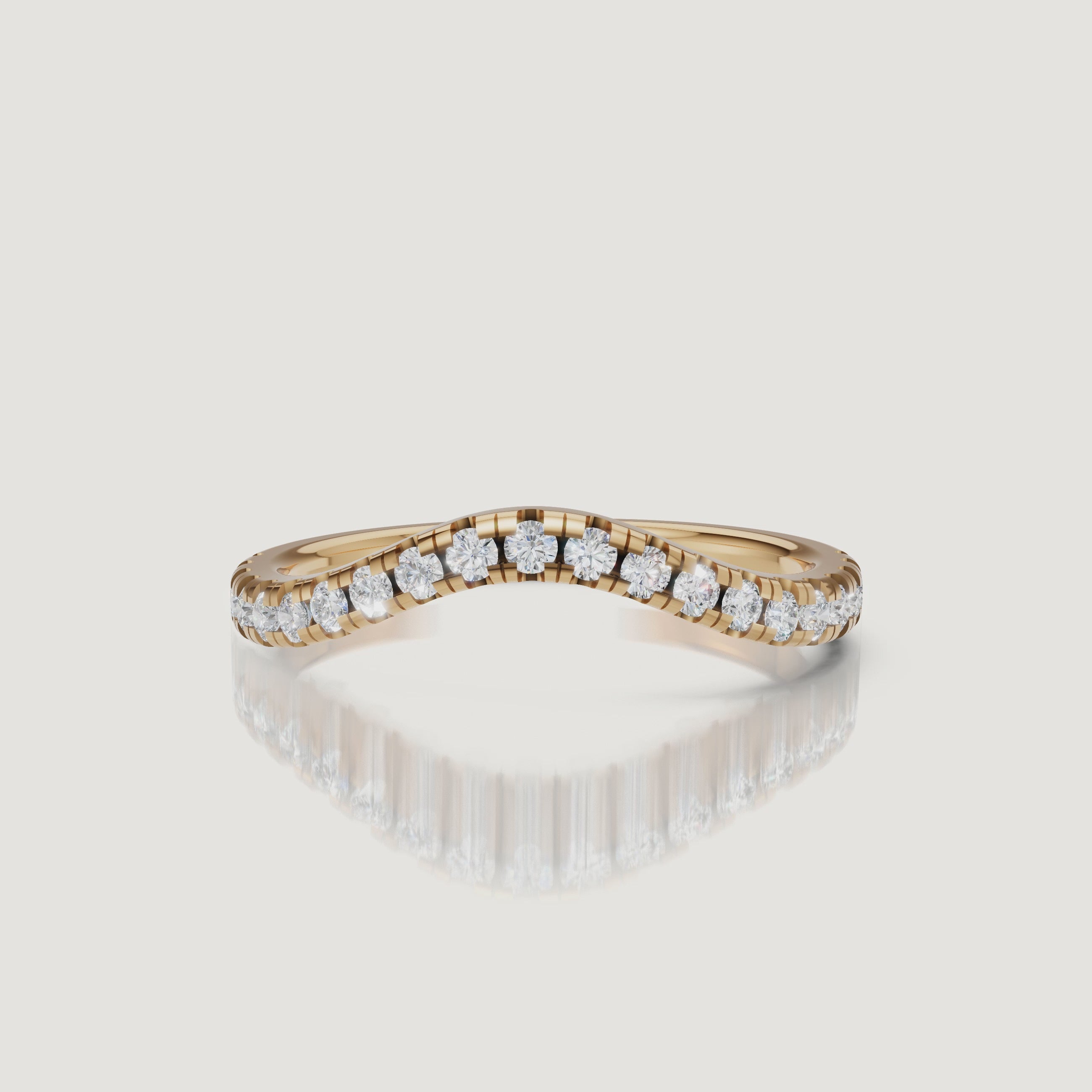 Yellow gold curved diamond wedding band video by Raul Diamonds with pavé diamond sparkle