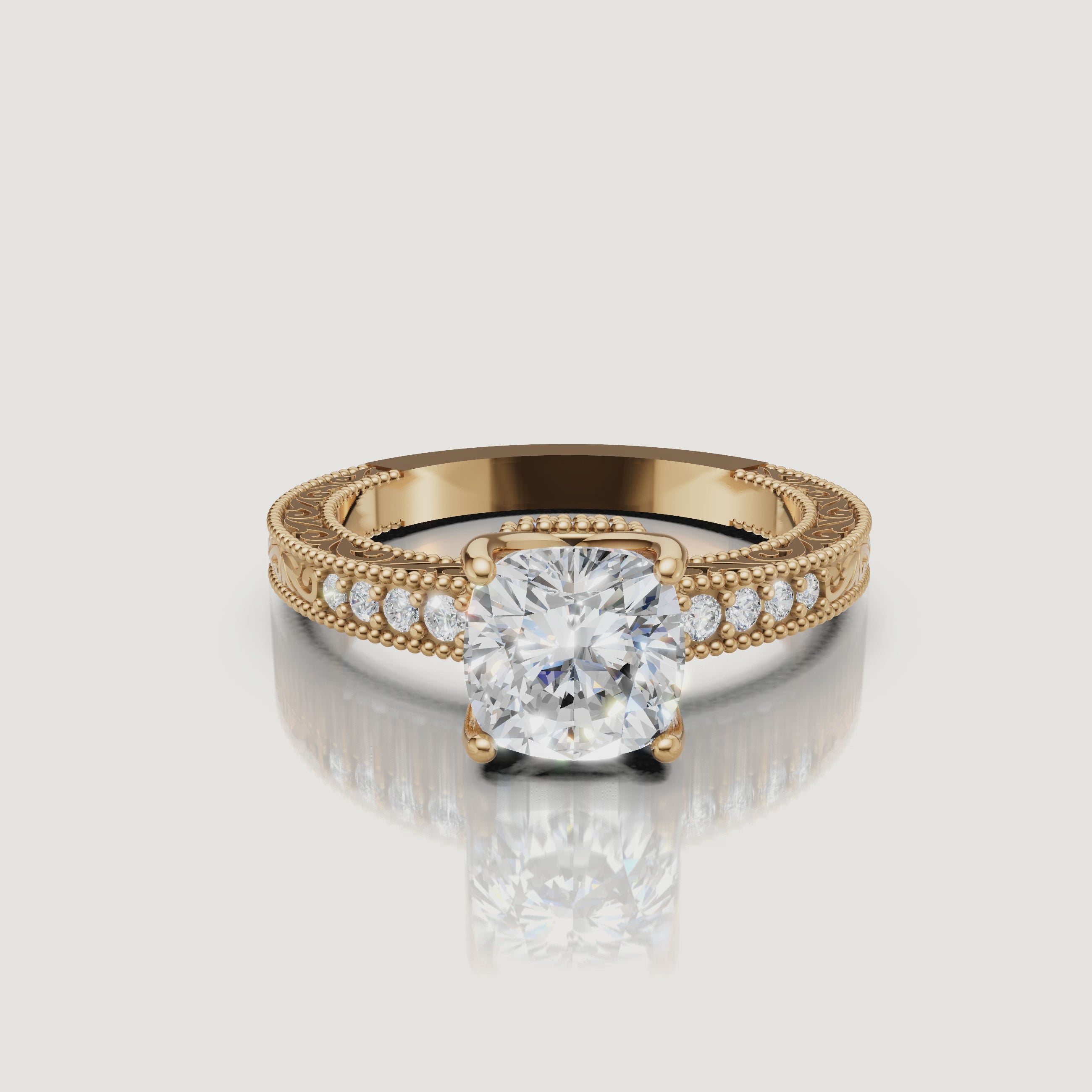 360 video of vintage cushion cut lab grown diamond engagement ring in 14K yellow gold with intricate filigree detailing by Raul Diamonds.