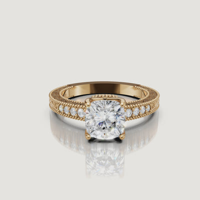 360 video of vintage cushion cut lab grown diamond engagement ring in 14K yellow gold with intricate filigree detailing by Raul Diamonds.
