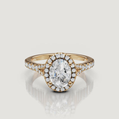 A stunning 360-degree video of a Raul Diamonds oval cut engagement ring in yellow gold, highlighting the shimmering halo and split shank detail