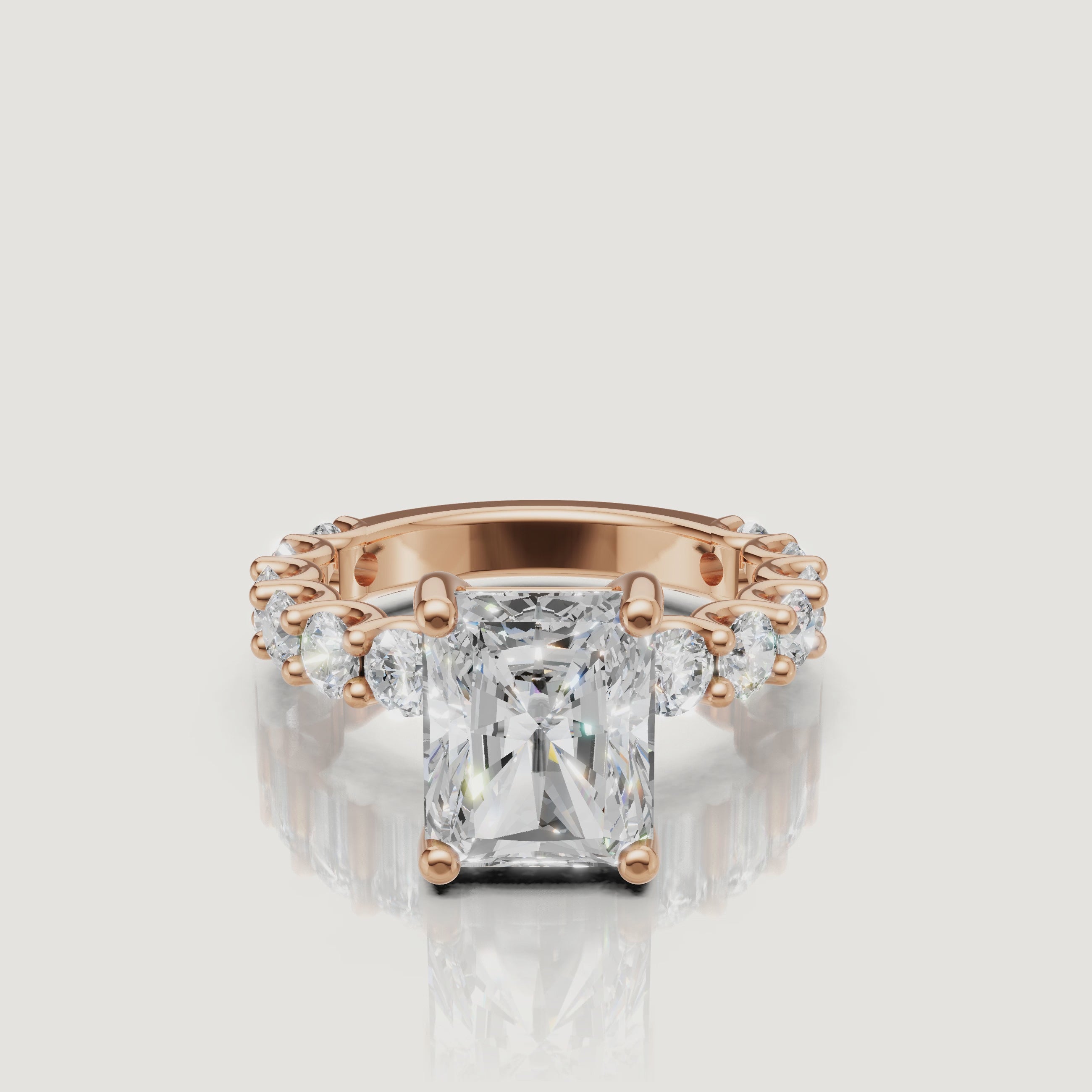 Cinematic profile rotation of a rose gold radiant-cut engagement ring by Raul Diamonds, showing the stunning side-view architecture and sparkling shank