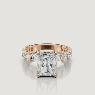 Cinematic profile rotation of a rose gold radiant-cut engagement ring by Raul Diamonds, showing the stunning side-view architecture and sparkling shank