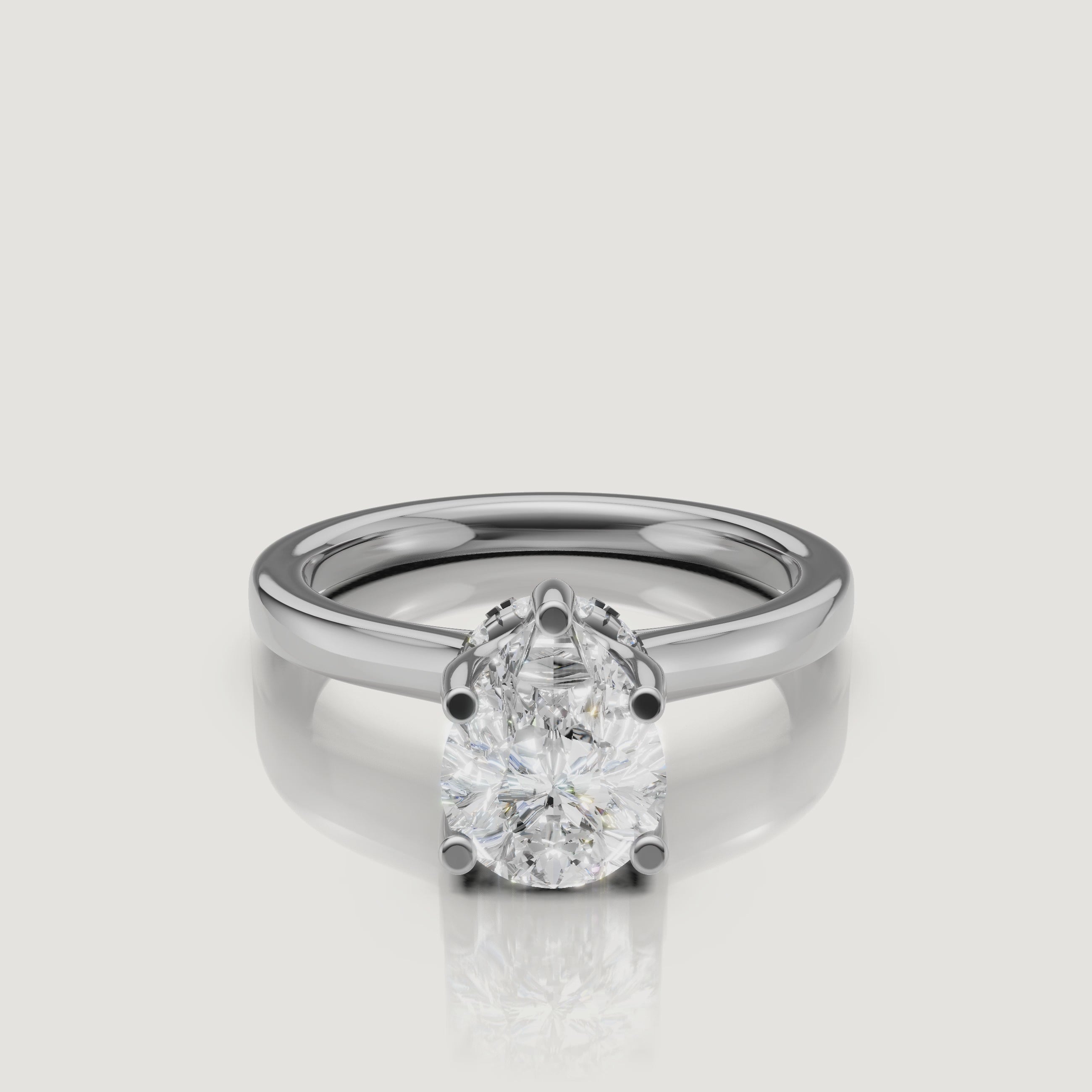 video of pear cut lab grown diamond solitaire engagement ring in 14k white gold