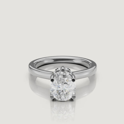 video of pear cut lab grown diamond solitaire engagement ring in 14k white gold