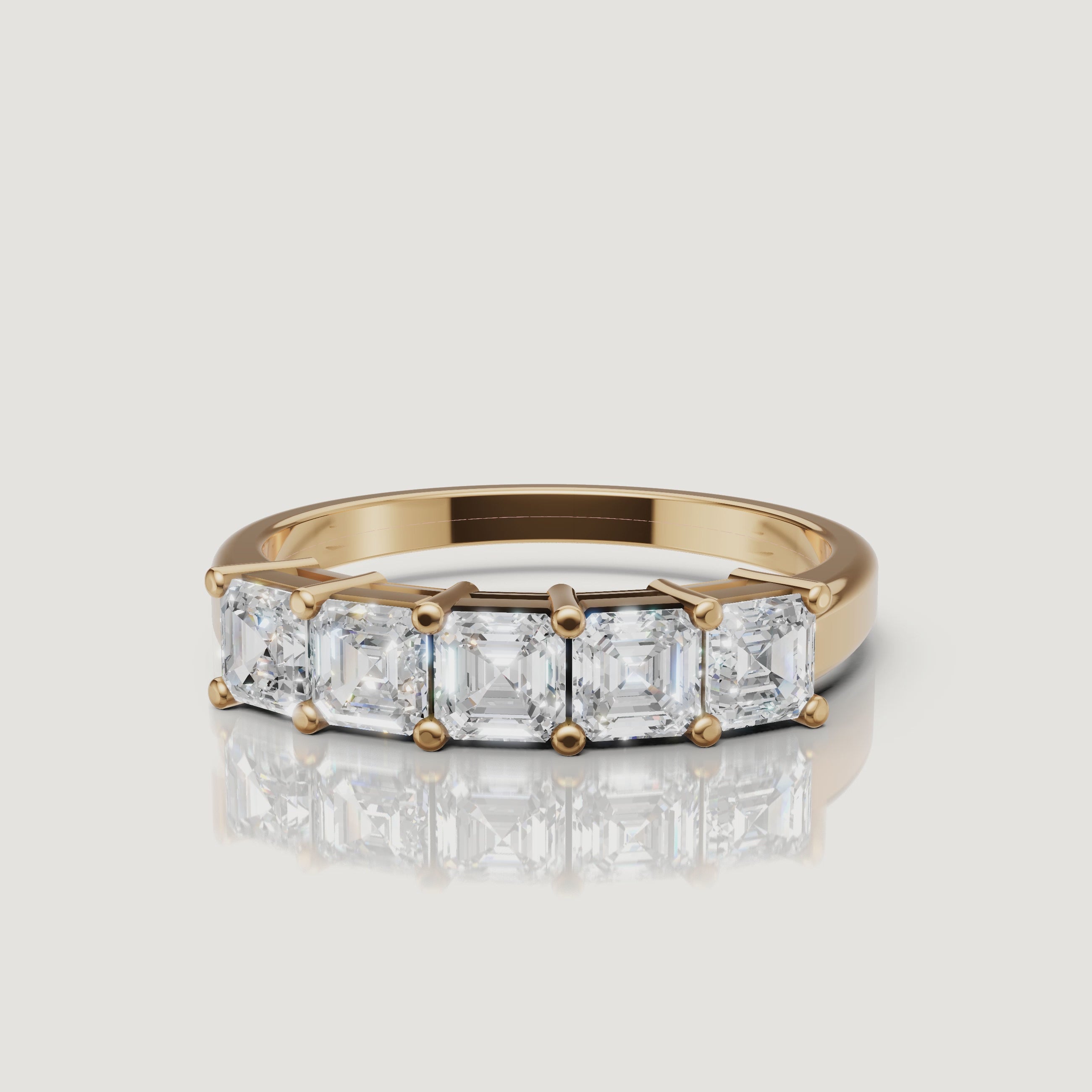 Raul Diamonds yellow gold Asscher cut diamond wedding band video with five stone luxury design