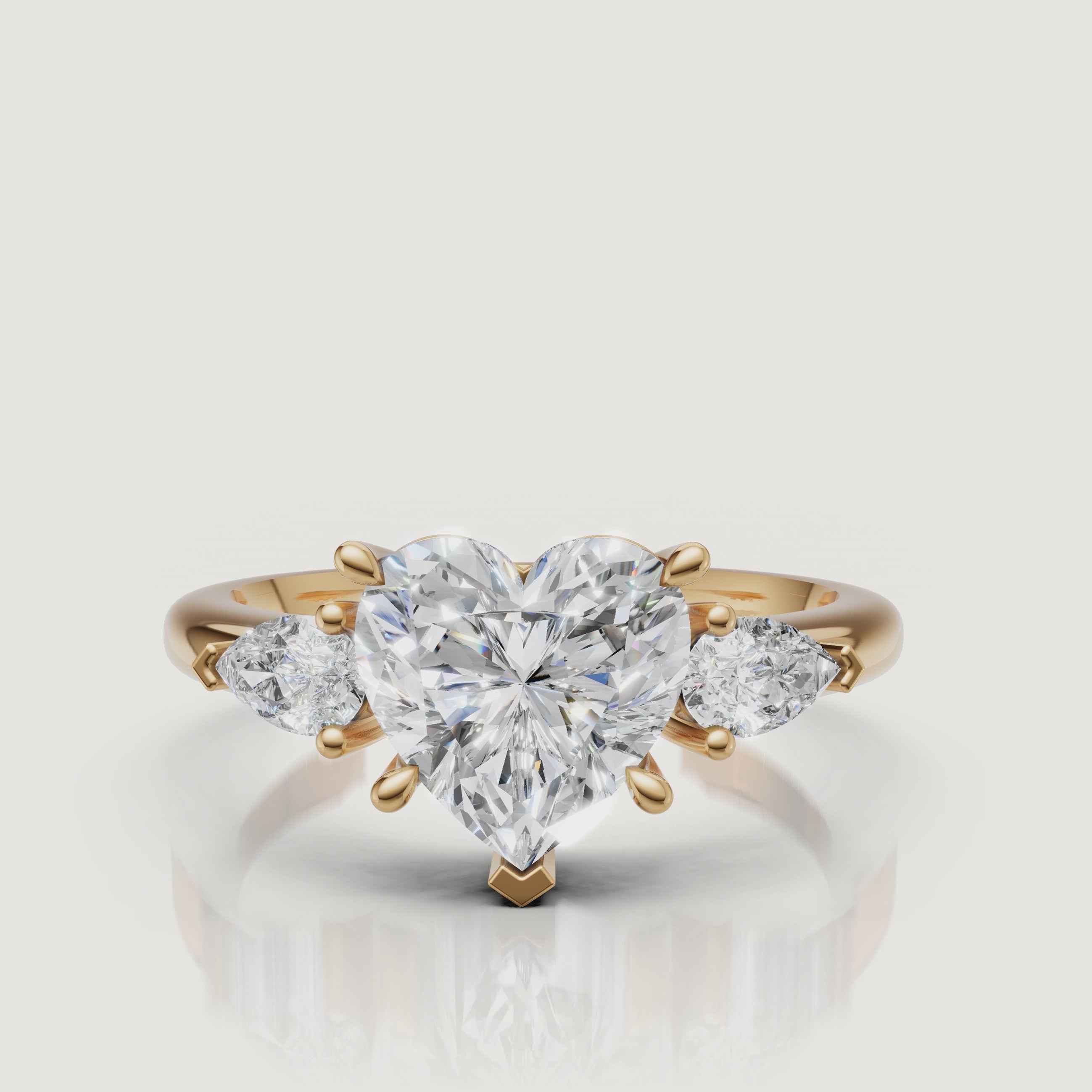 Detailed video showcase of the Raul Diamonds heart-shaped diamond ring in 18k yellow gold