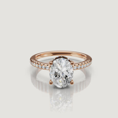 cinematic close up of elongated oval lab diamond solitaire ring in 14k gold