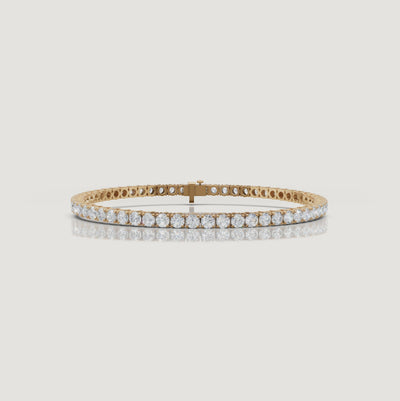 Cinematic video of a 5 carat lab grown diamond tennis bracelet in yellow gold by Raul Diamonds featuring macro diamond sparkle, graceful wrist movement, warm luxury lighting, and premium fine jewelry styling for modern women.